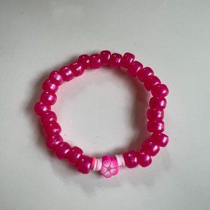 pink flower, clay, and pony beads